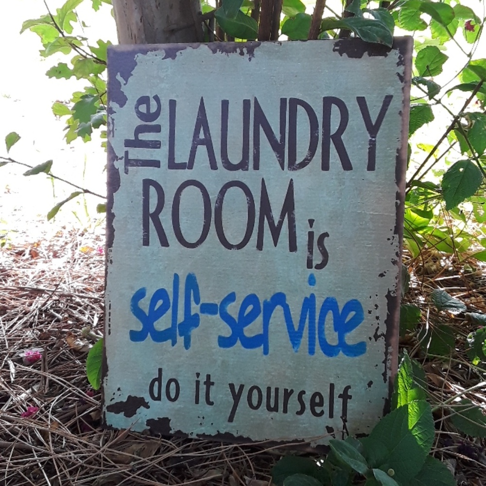 Metal laundry sign